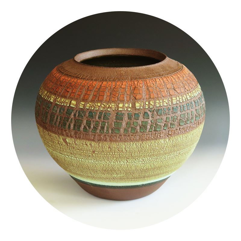 Rounded handmade vase with horizontal stripes by Jan Karon